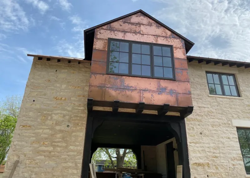 Copper metal panel facade on a stone building for Metal Roof Coating in East Hemet